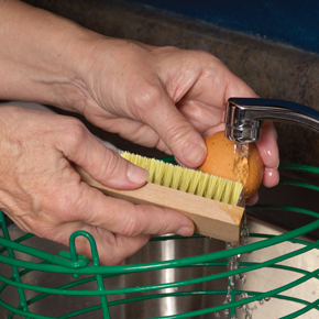 Cleaning eggs under water.